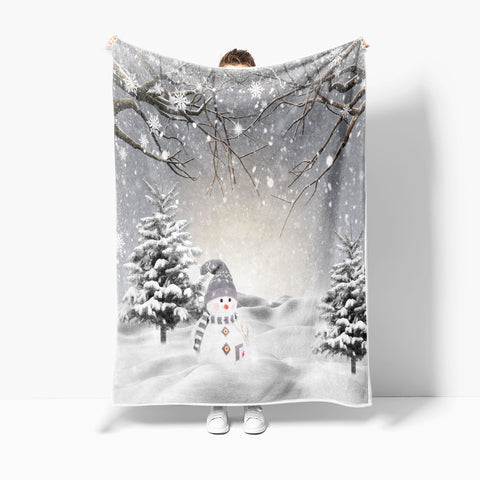 JAWO blanket draped on sofa in living room adding holiday warmth and style