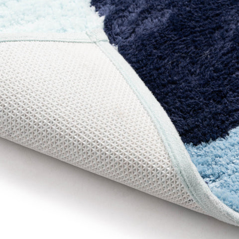 Jay Franco Bluey rug staged in a bathroom adding playful decor and safety