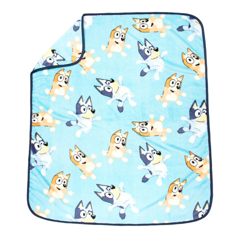Jay Franco Bluey blanket folded inside backpack for travel convenience