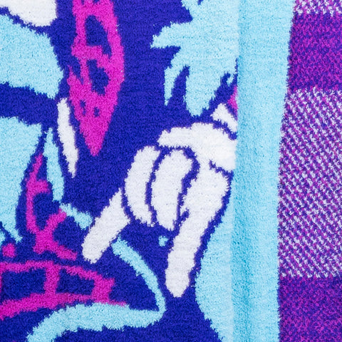 Jay Franco child wrapped in Gwen Stacy blanket for comfort during family time