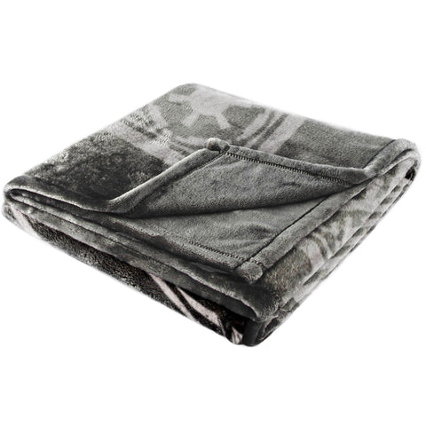 Jay Franco blanket in a reading scene offering comfort for lounging and movie nights