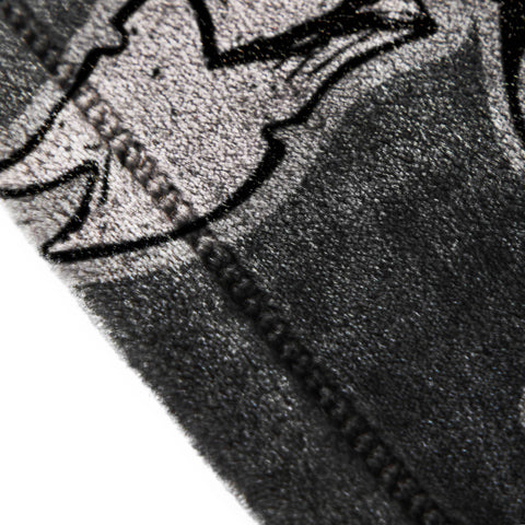 Jay Franco blanket draped at foot of bed providing warmth and decorative character