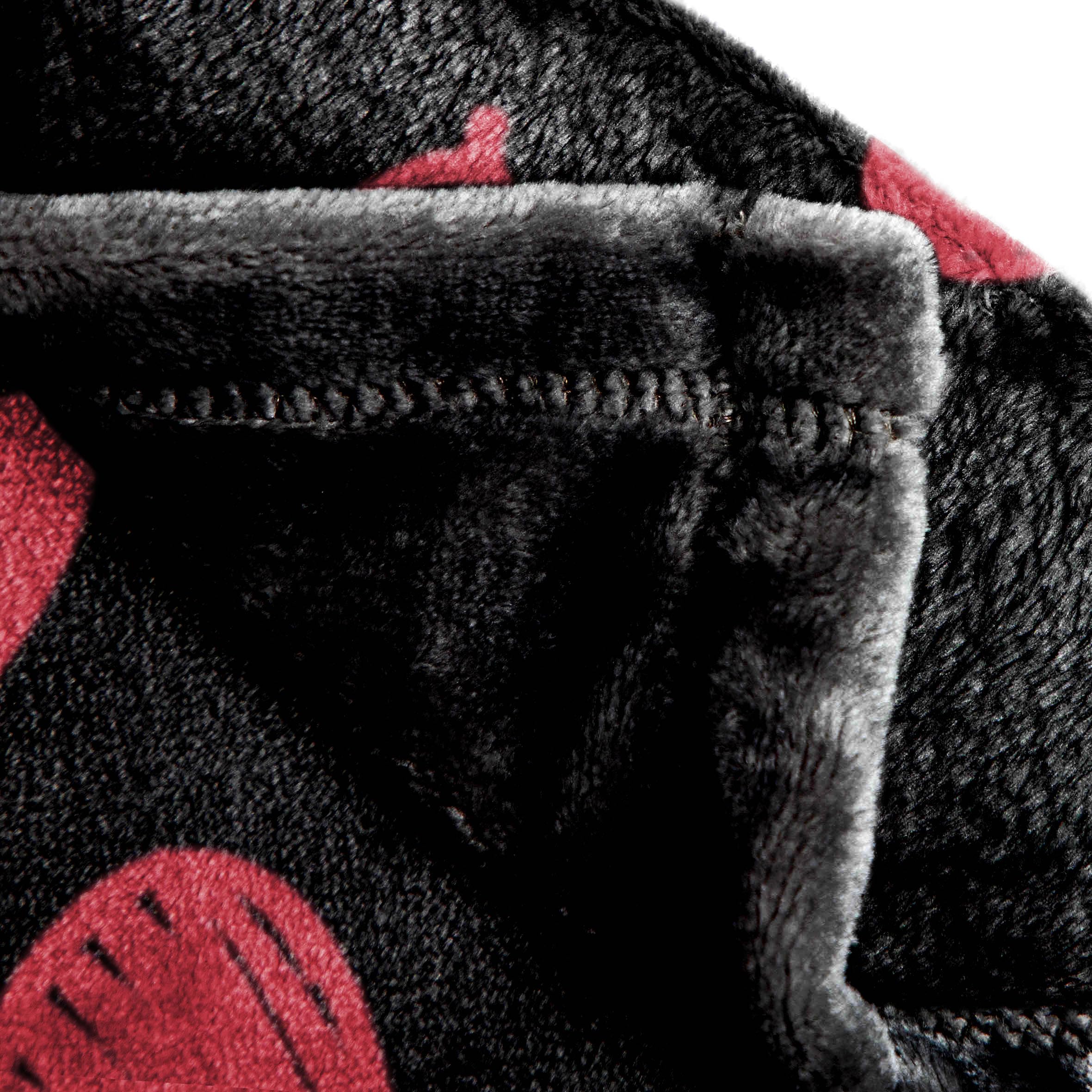 Jay Franco blanket wrapped around person showing cozy warmth and comfortable lounging benefit
