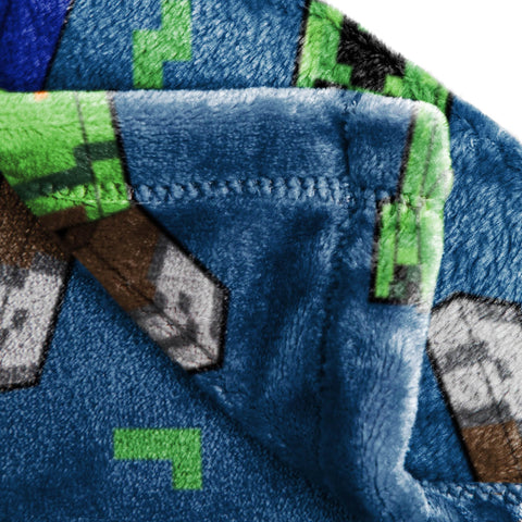 Jay Franco folded throw rolled up for travel and compact storage convenience