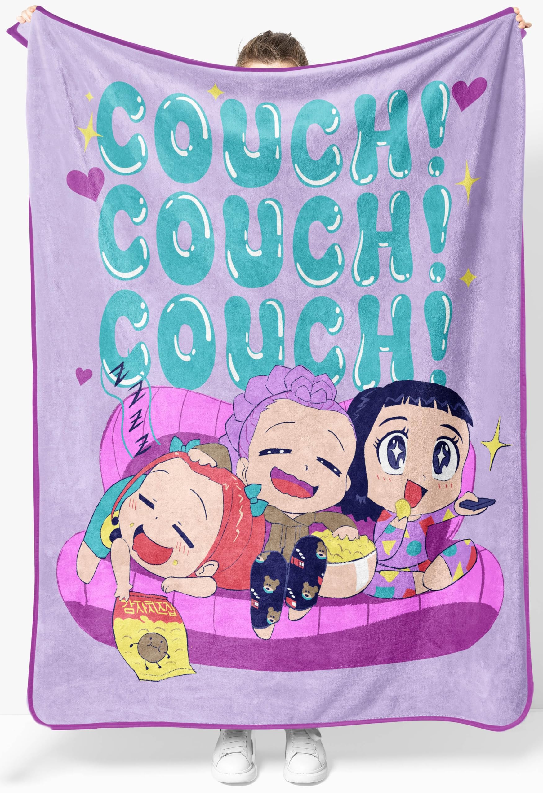 Jay Franco front view of Huntrix throw showcasing chibi characters and bright couch, adds playful decoration