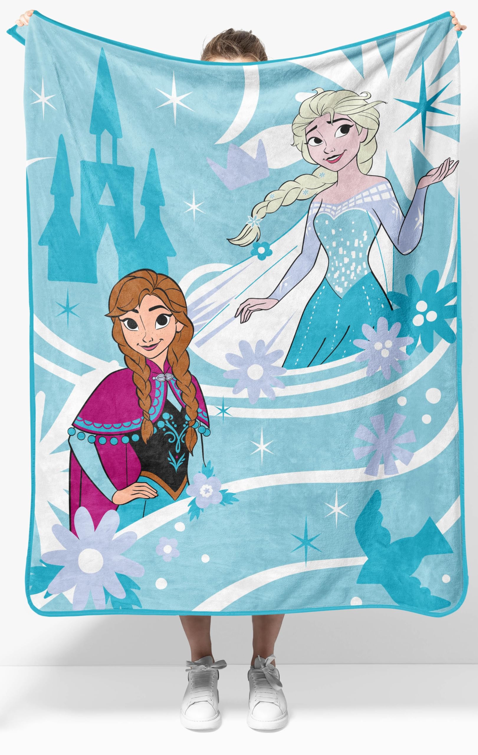 Jay Franco Frozen throw front design showing Elsa Anna and Olaf, bright and cozy