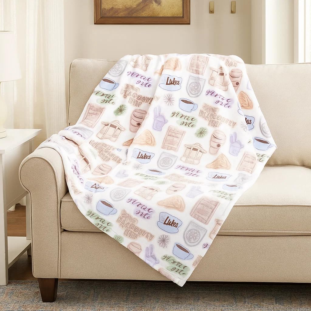 Jay Franco close-up of plush fleece pattern showing vibrant Stars Hollow icons