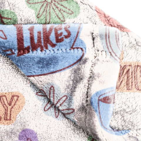 Jay Franco care label and fabric detail showing easy machine-wash benefit