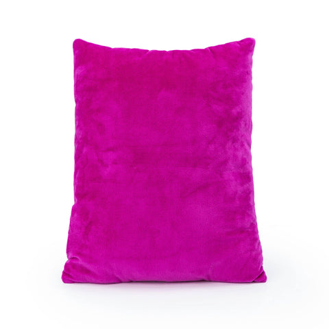 Jay Franco pillow next to a book showing 15-inch scale for travel and cuddling