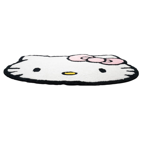 Jay Franco Hello Kitty rug next to shoe for size comparison and scale