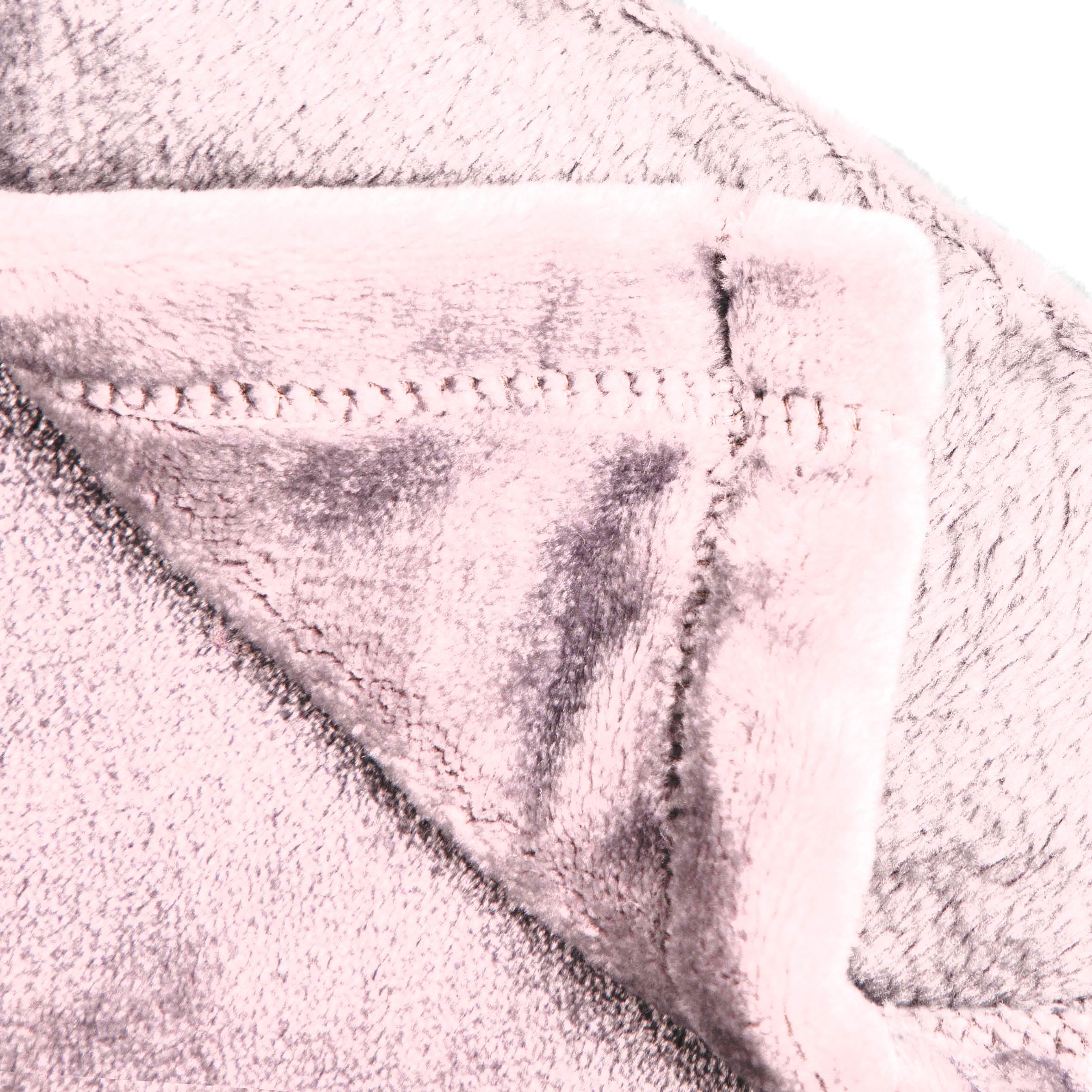 Jay Franco Hello Kitty throw styled on bed adding playful decor and warmth