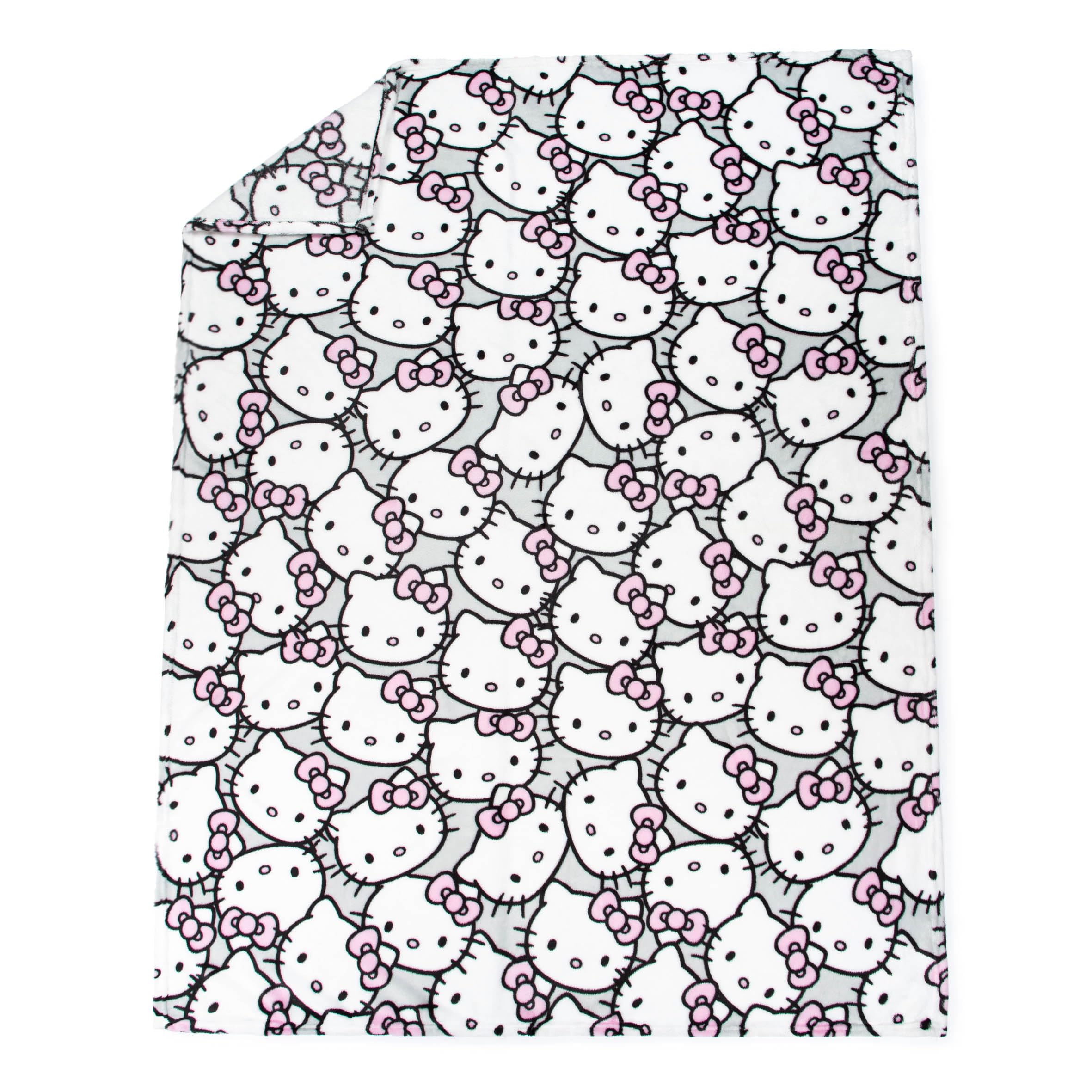 Jay Franco Hello Kitty throw draped on sofa adding playful decor