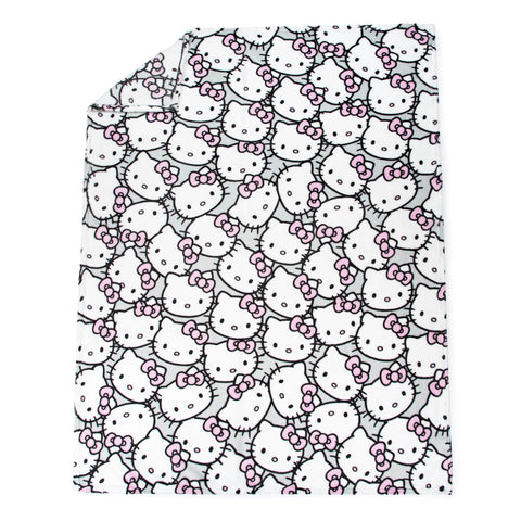 Jay Franco Hello Kitty throw draped on sofa adding playful decor