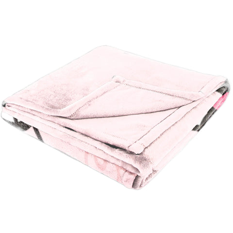 Jay Franco Hello Kitty throw draped over sofa showing lounge-ready comfort