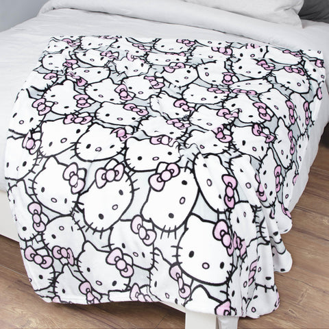 Jay Franco Hello Kitty next to ruler showing 46 x 60 inch scale