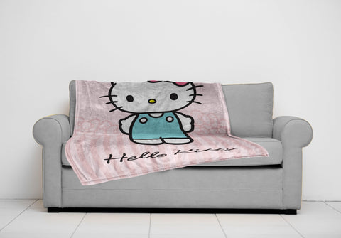 Jay Franco Hello Kitty throw next to ruler showing 50x70 inch size clarity