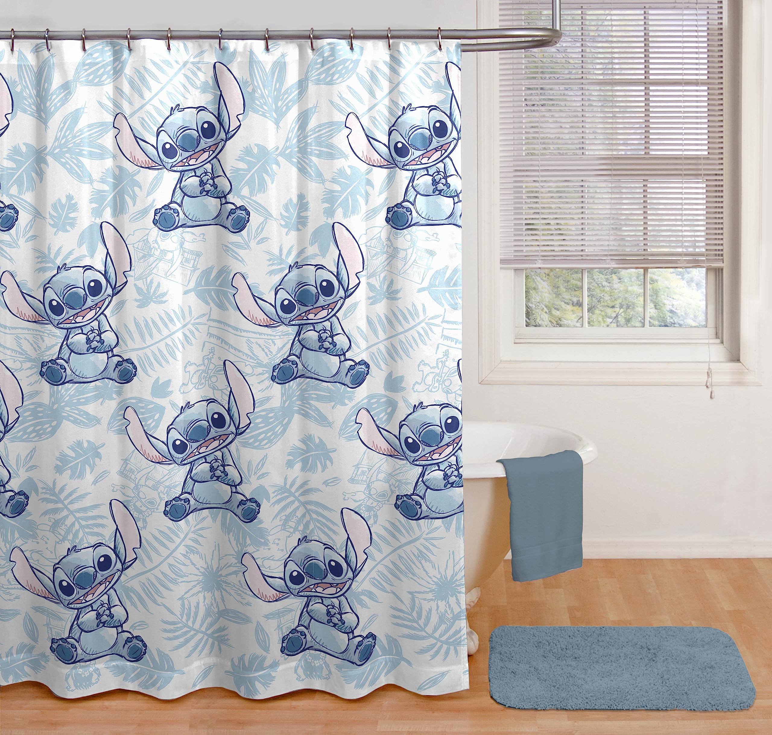 Jay Franco bathroom scene with curtain and loofah creating coordinated style