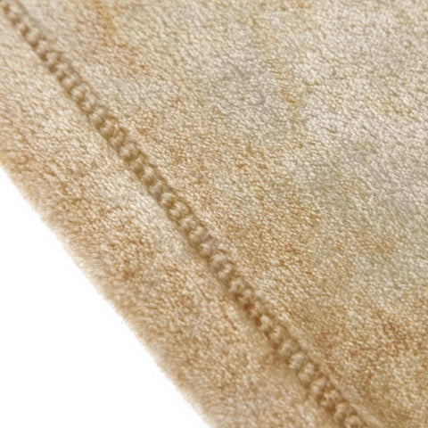 Jay Franco blanket rolled for storage demonstrating compact portability and travel readiness