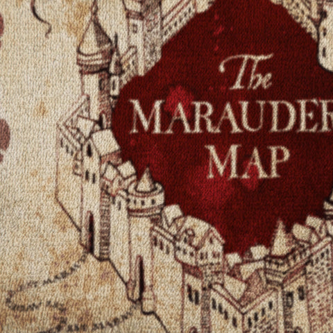 Jay Franco Marauder's Map throw styled on a child's bed adding themed decor and warmth