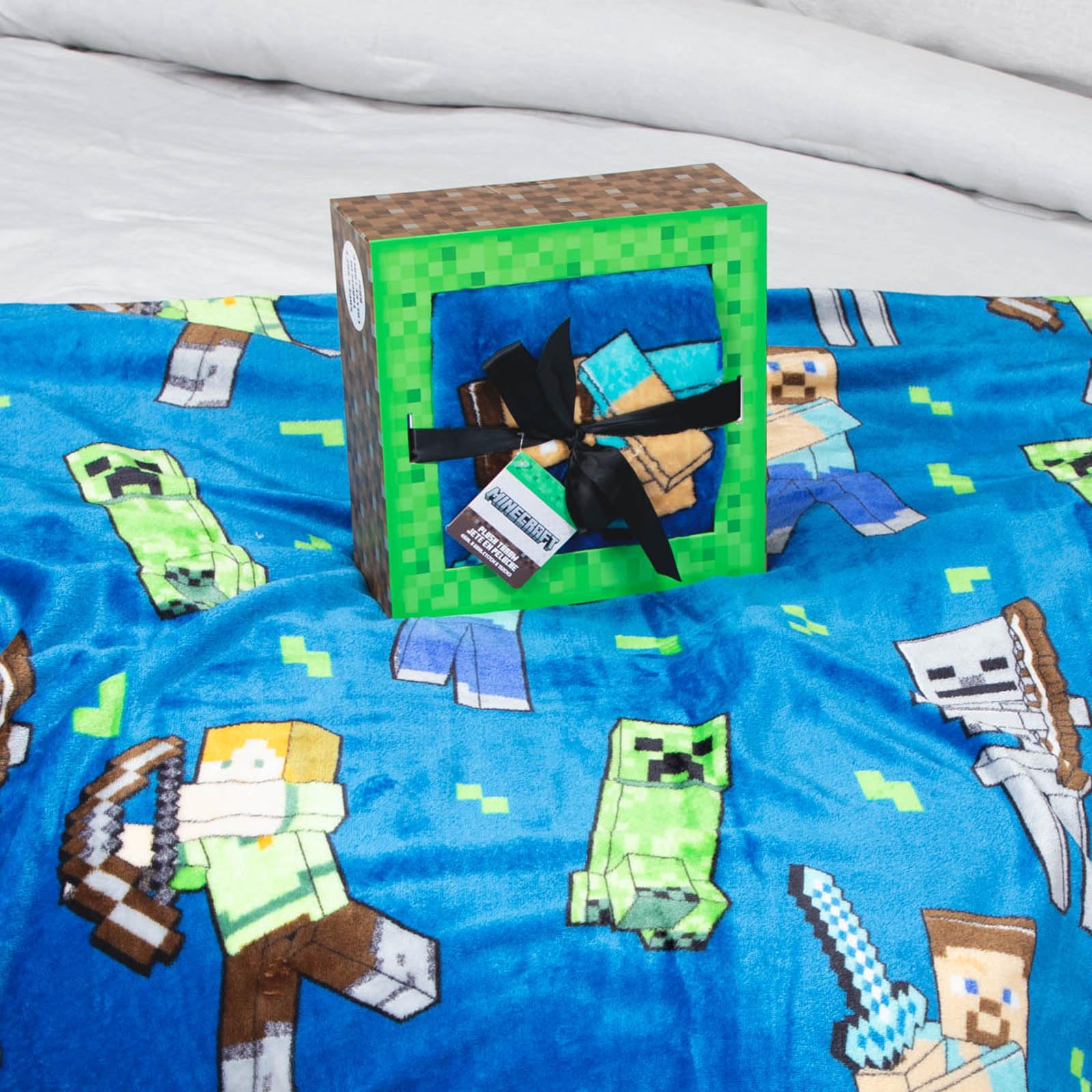 Jay Franco throw front view shows Minecraft characters and bright design for room decoration