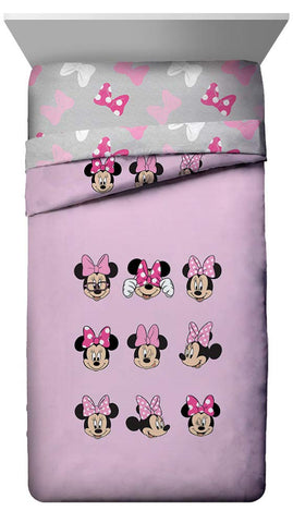 Jay Franco Minnie Mouse fitted and flat sheets folded for neat bedding setup
