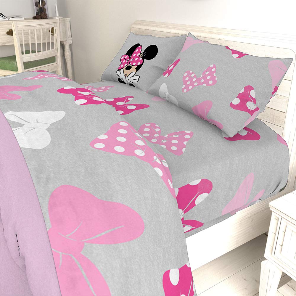 Jay Franco Minnie Mouse care label close-up highlighting easy machine-wash instructions