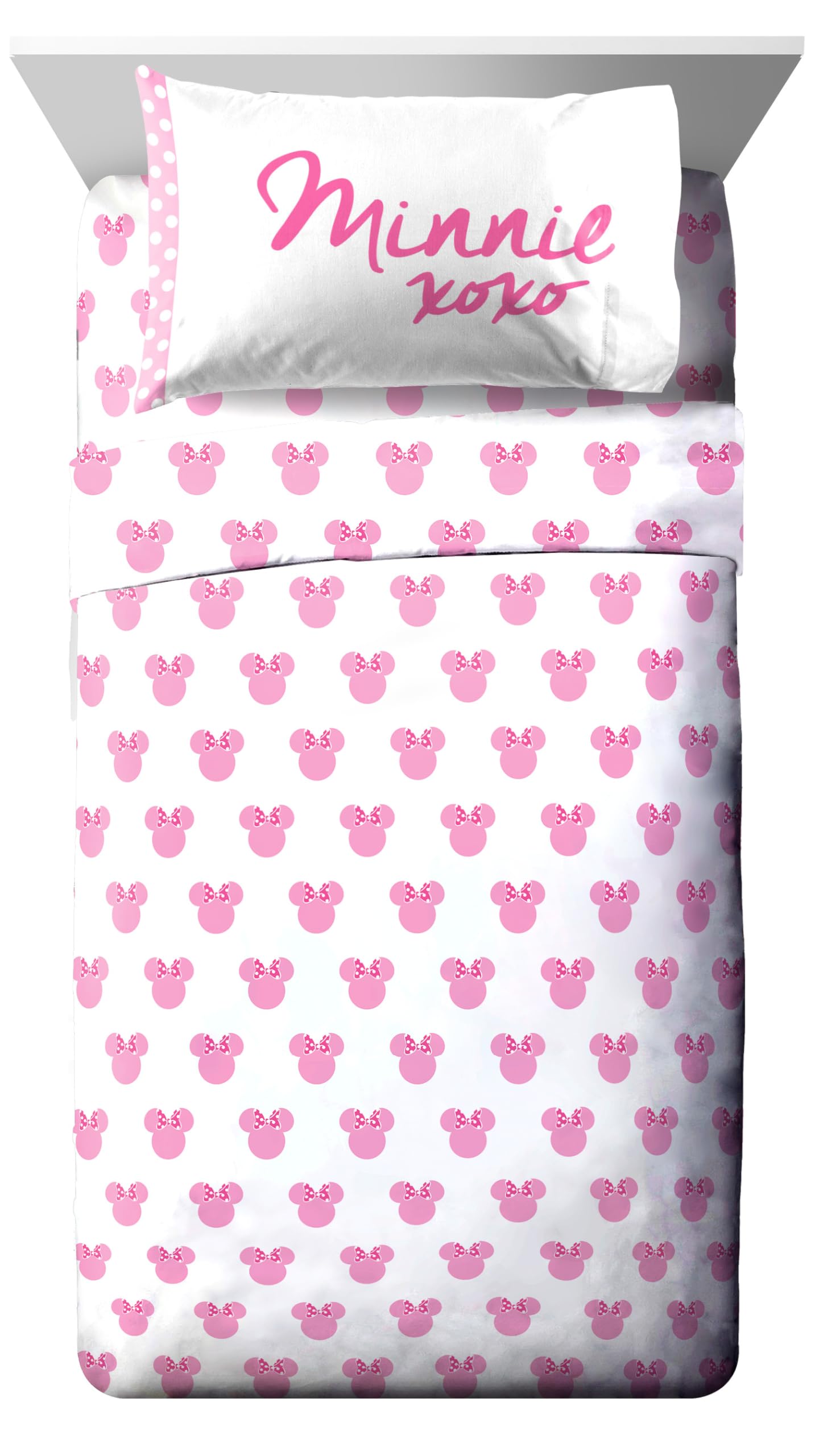 Jay Franco Minnie Mouse sheets and pillow close-up showing soft brushed polyester texture, ensures cozy comfort