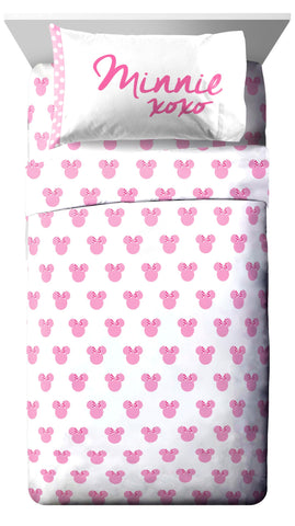 Jay Franco Minnie Mouse sheets and pillow close-up showing soft brushed polyester texture, ensures cozy comfort