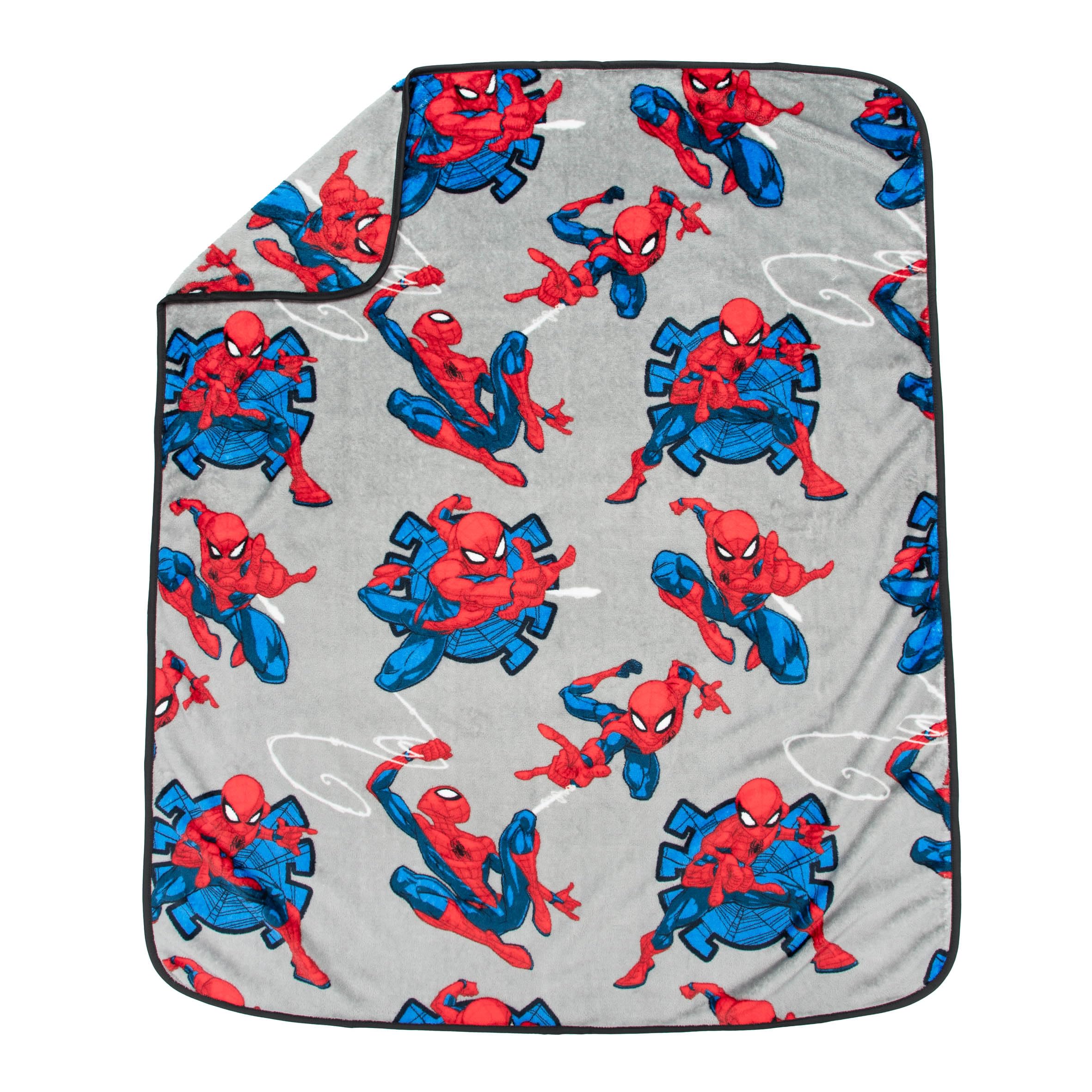 Jay Franco Spiderman neatly rolled blanket demonstrating compact travel-friendly size