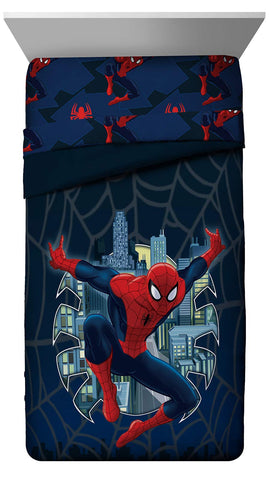 Jay Franco comforter front view on bed showing Spiderman graphics and bright color benefits