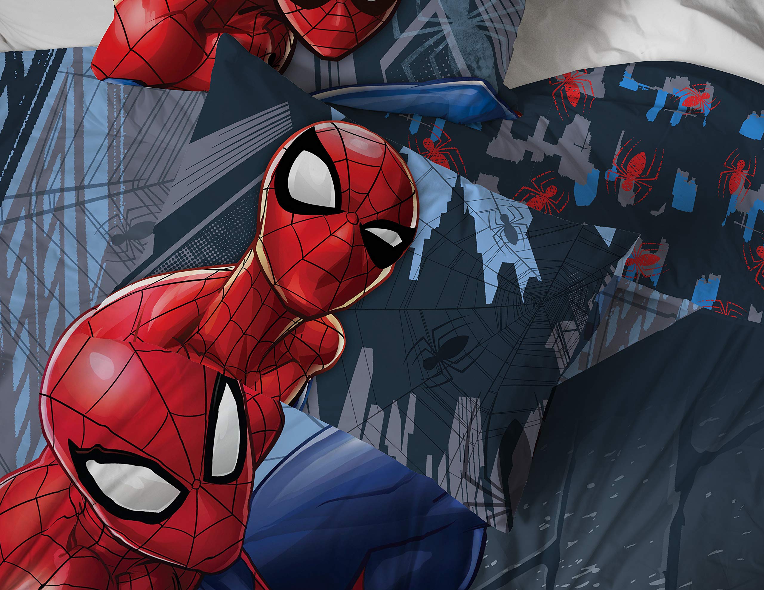 Jay Franco Spiderman bedding rolled up for travel and simple storage convenience