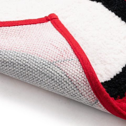Jay Franco view of non-slip backing demonstrating secure grip on bathroom floors benefit