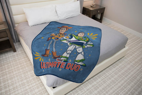 Jay Franco folded blanket beside a ruler showing 46 by 60 inch scale benefit