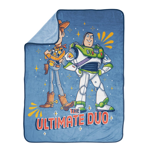 Jay Franco blanket draped on sofa creating cozy Toy Story-themed living space