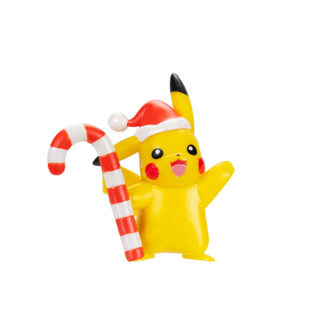 Jazwares Pokémon figure next to a ruler showing two-inch scale accuracy