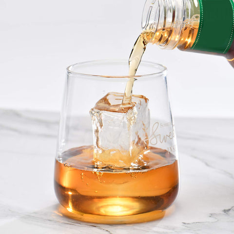 Jell-Cell ice cube in whiskey glass demonstrating elegant presentation benefit