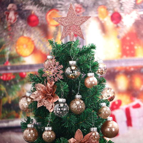 Jenaai tree topper detail, shows polished rose gold accent and secure mount