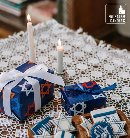 Jerusalem Candles held in hand showing size and easy fit in standard holders