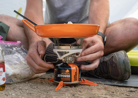 Jetboil Summit Skillet handle with nested spatula for secure storage and convenient flipping