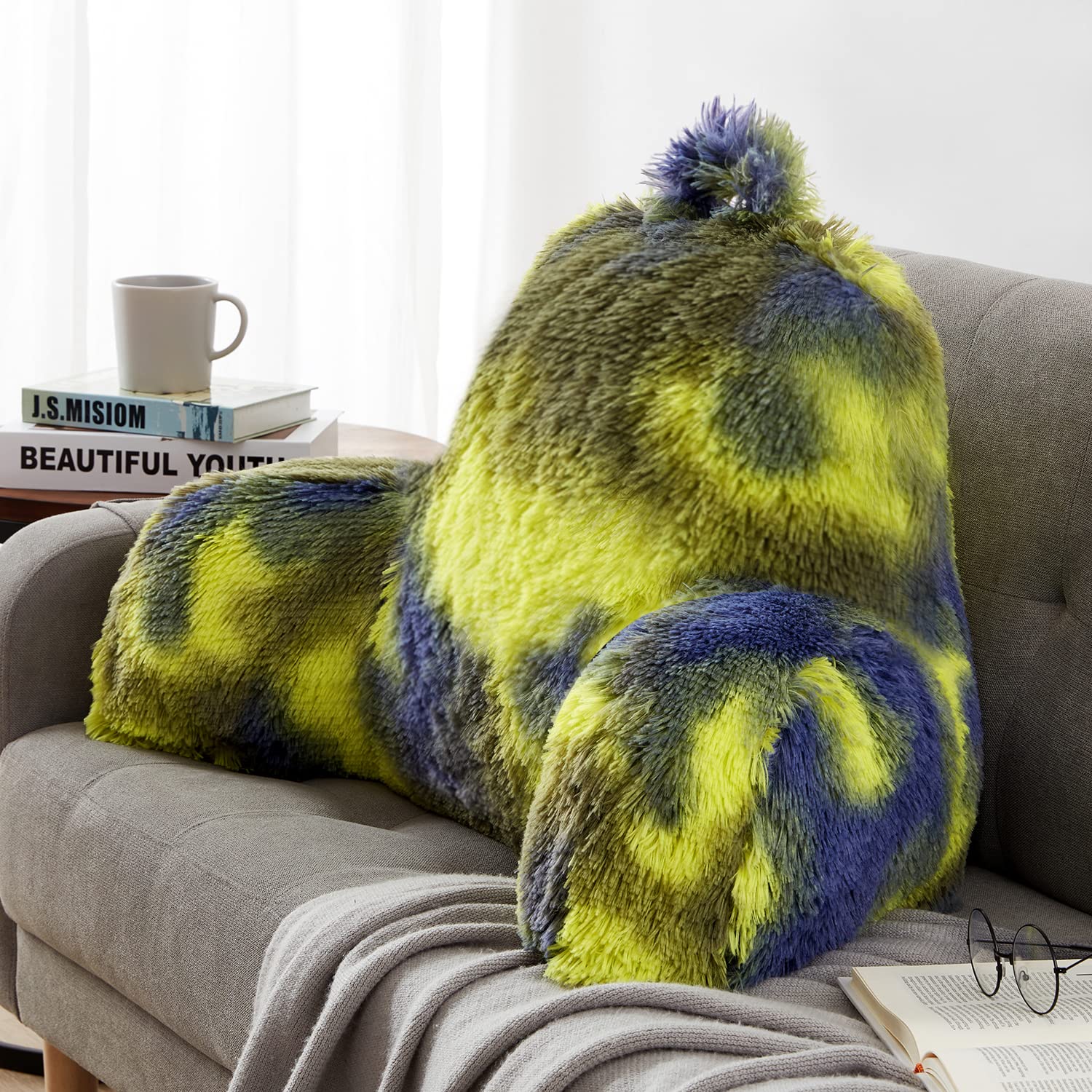 Jillche Bed styled on bed illustrating trendy decor and lounge comfort