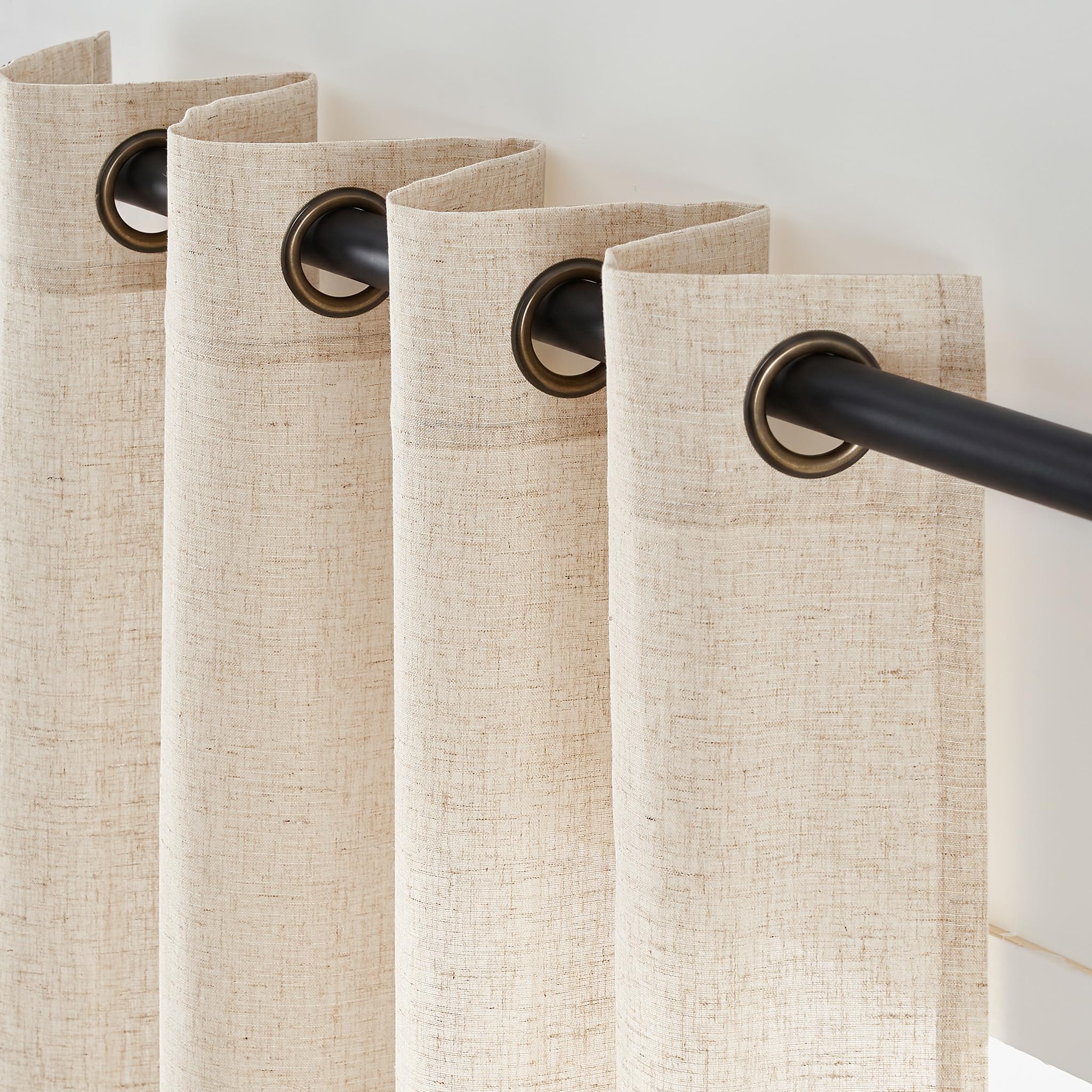 jinchan front view showing beige curtains framing window and adding warmth