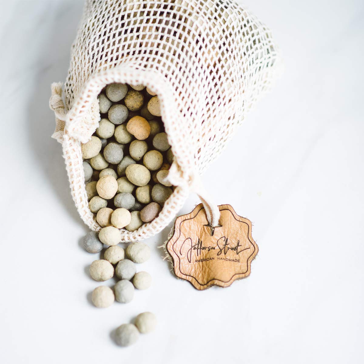 JJ Potts ceramic pie weights front view showing packed beads and mesh bag benefit even baking