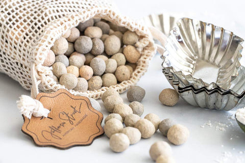 JJ Potts beads on a kitchen scale showing 2.4 lb set for accurate coverage