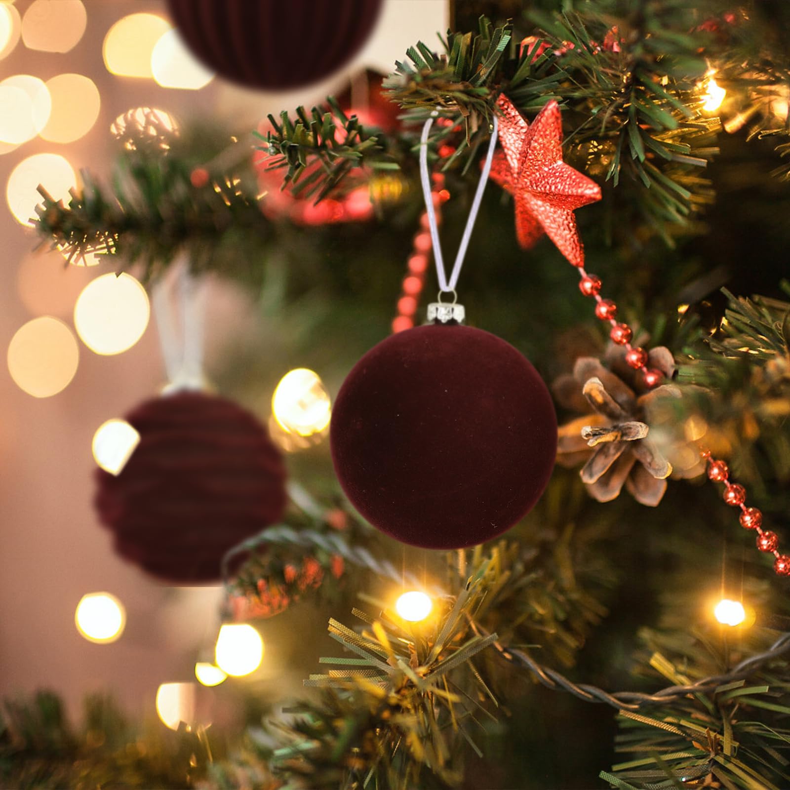 Jlong ornaments arranged on wreath and garland demonstrating versatile styling benefit
