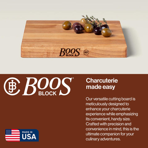 John Boos board in use slicing bread to demonstrate stable cutting surface and compact size