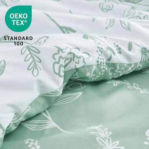 Joiedomi folded comforter next to ruler showing compact storage and scale benefit