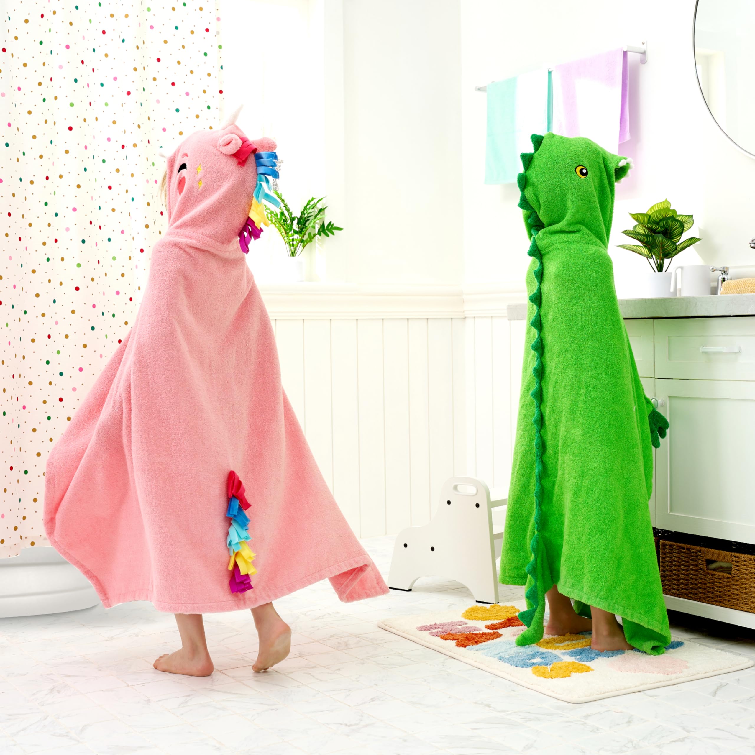 Joiedomi dinosaur towel at beach in use protecting child from sun