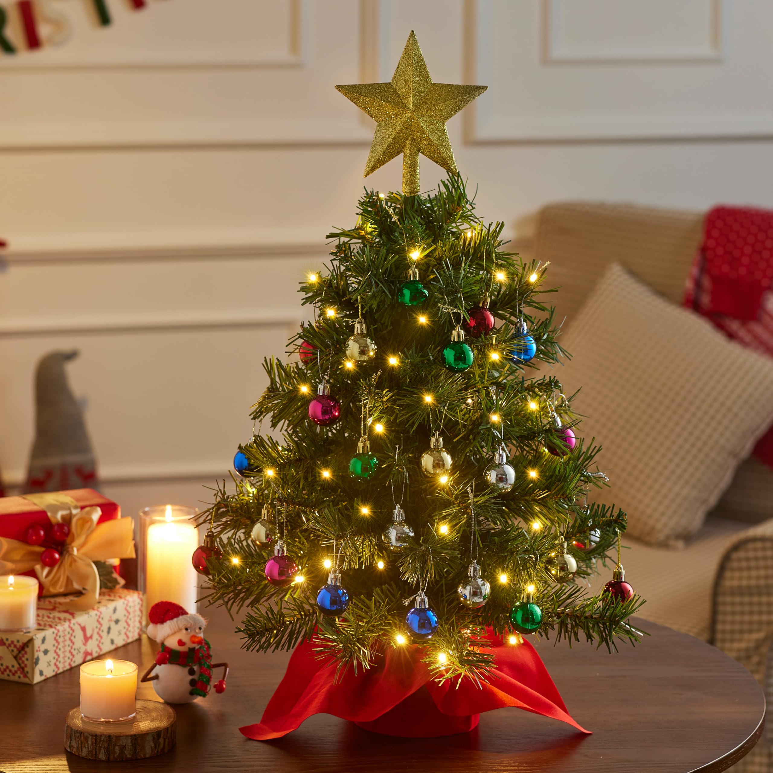 Joiedomi mini tree styled on tabletop in living room showing festive ambience benefit