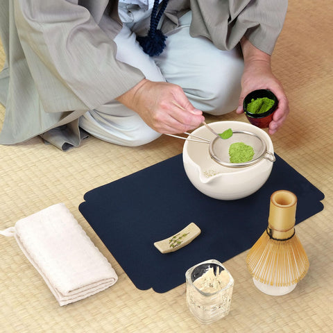 Joiish whisk in use creating frothy matcha for rich texture