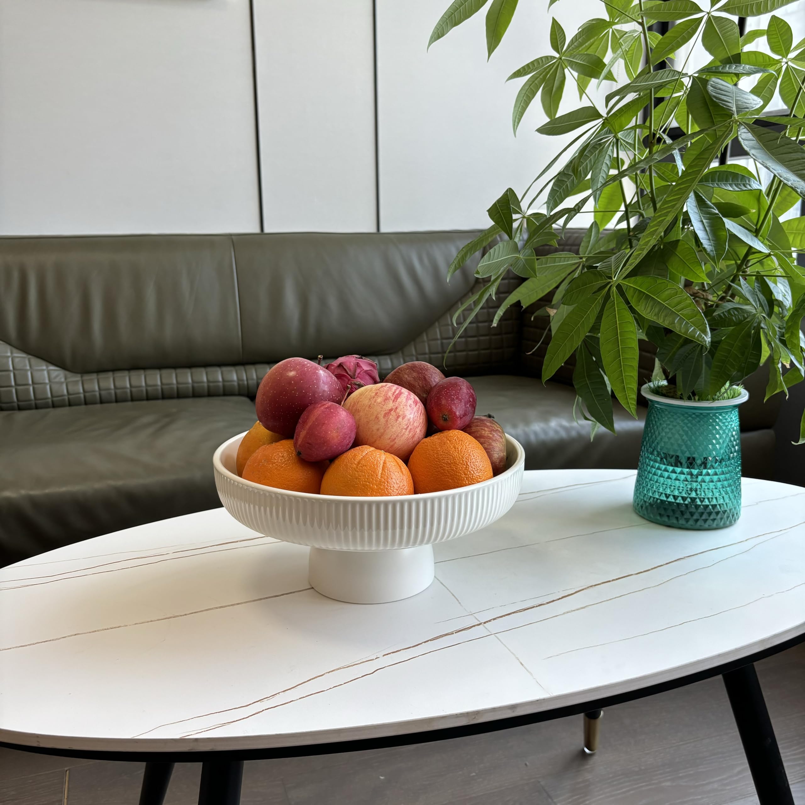 JolieJulie bowl filled with fruit on counter providing organized, attractive display